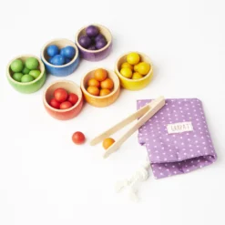 Wooden Bowls With Marbles And Tongs